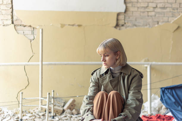 istock A woman near a house 2187378753