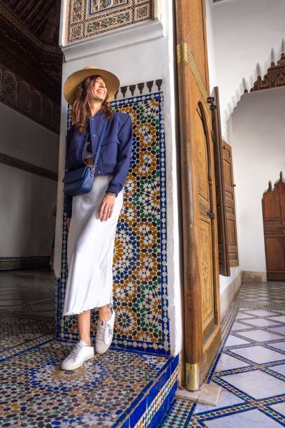 istock Woman in Moroccan Palace with Tilework 2187382576