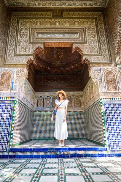 istock Woman in Moroccan Tiled Courtyard 2187382578