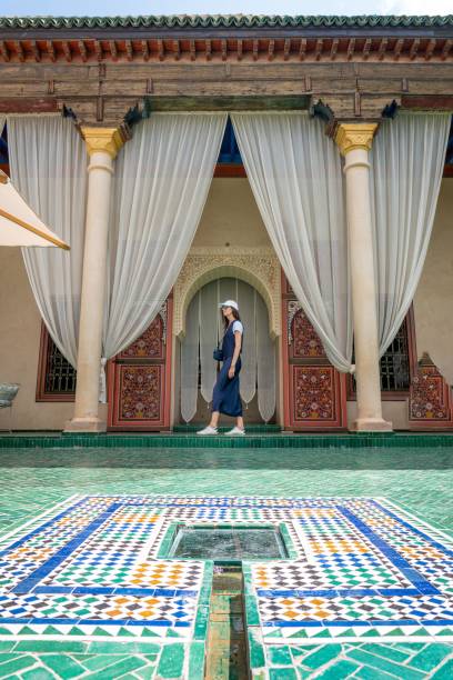istock Woman walking at Bahia Palace, Marrakech 2187382608