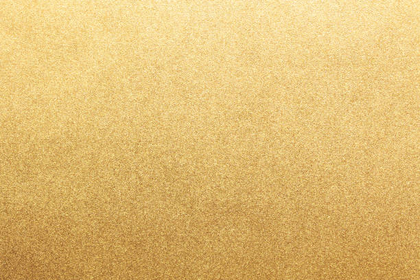 istock gold color glitter paper abstract. grunge texture background. retro styled concept. 2187383174