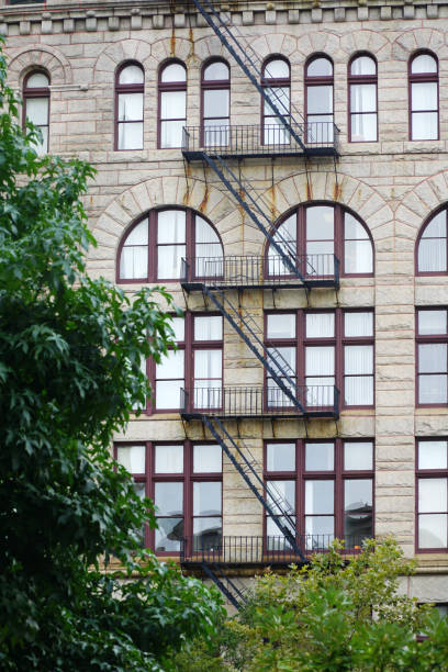 istock Fire ladder on the side of the old building 2187390753