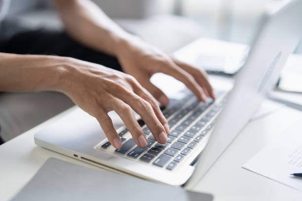 istock Business man working using laptop computer Hands typing keyboard. Professional investor working start up project. business planning in office. Technology business Concept 2187391978