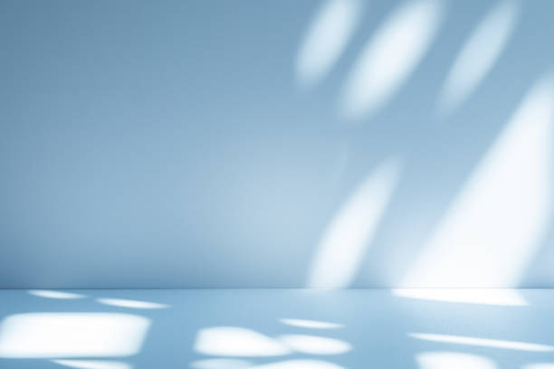 istock Studio style background wall decoration presentation uses white and blue tones. with shadows cast from a nearby window, concept creating a decorative 2187393164