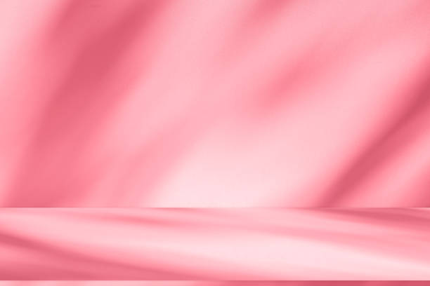 istock Wall interior background, studio, and backdrops show products. with shadow from window color white and pink light. background for text insertion and presentation of product 2187393176