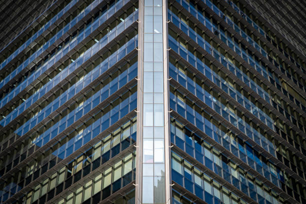 istock Symmetrical geometric pattern, facade of a modern business building. 2187401590