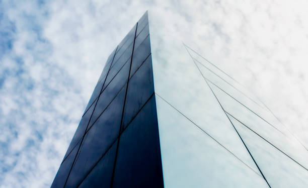 istock wall of a modern building against the sky and clouds 2187402952