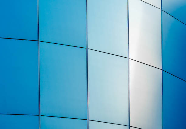 istock wall of the building with blue panels 2187404152