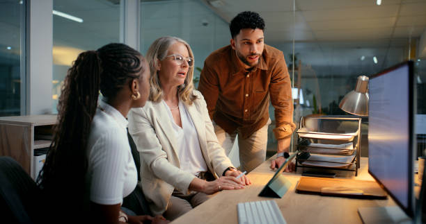 istock Business, people and teamwork at office on computer for meeting and collaboration as copywriter. Employees, coworking and planning with ceo or boss with strategy or proposal for creative project 2187408445
