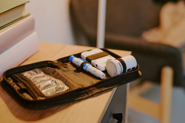 Organizing Diabetes Medication on Wooden Desk