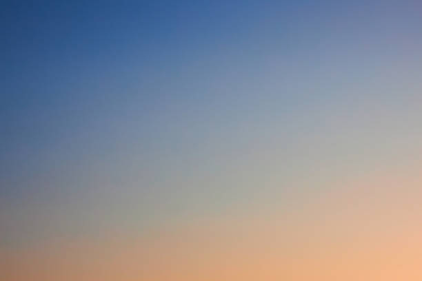 istock Gradient from blue to pink yellow. Cloudless clear sky at sunset, background 2187416769