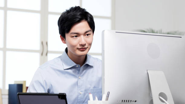 istock Businessman working on a computer in the office 2187422225