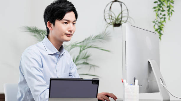 istock Businessman working on a computer in the office 2187422517