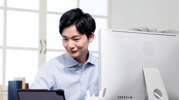 istock Businessman working on a computer in the office 2187422523