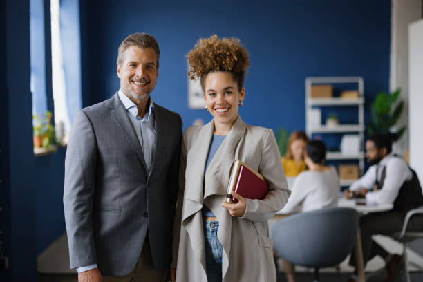 istock Happy business colleagues enjoying in the office. 2187423736