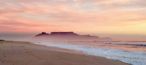 Beautiful pastel clouds over Table Mountain, South Africa, at dusk