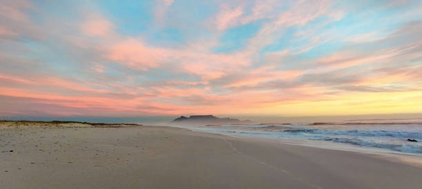 istock Beautiful pastel clouds over Table Mountain, South Africa, at dusk 2187427357