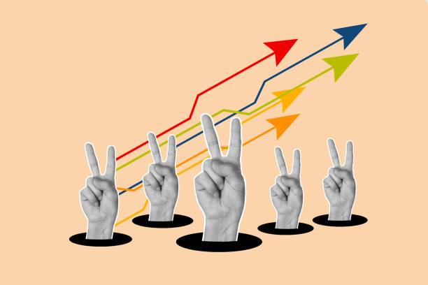 istock Hands doing victory gesture on a orange background with colored ascending arrows chart 2187434094