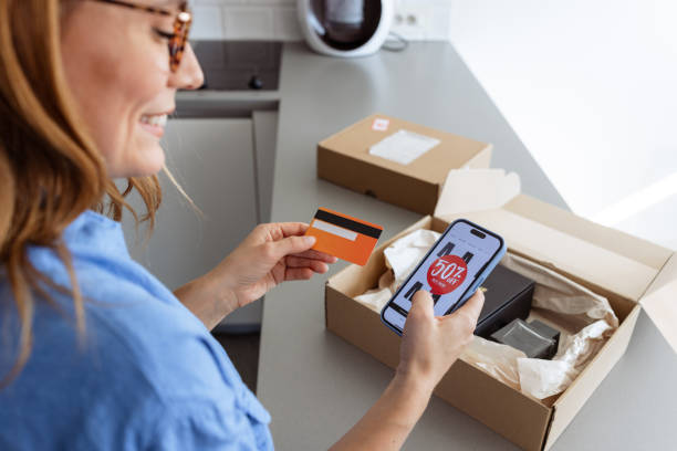 istock Woman using smart phone for online shopping 2187434581