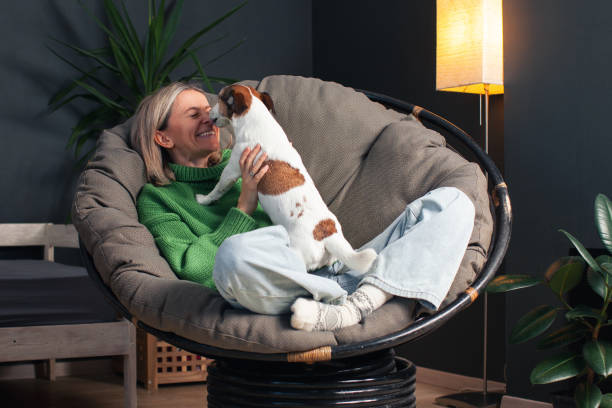 istock Woman Spending day with her Dog at Home 2187437039