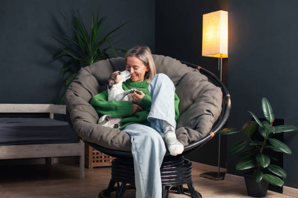 istock Woman Spending day with her Dog at Home 2187437040