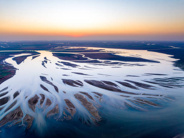 istock Autumn lake surface, traces of water flow 2187440175
