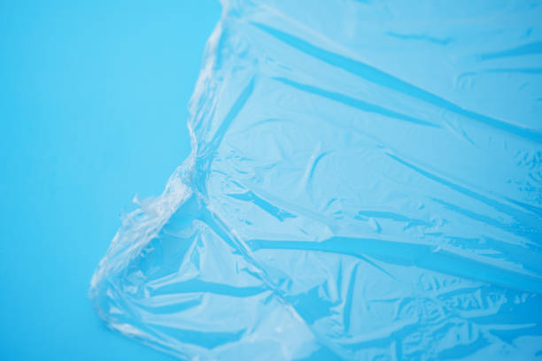 istock Transparent stretch film for packaging on a blue background. 2187441800