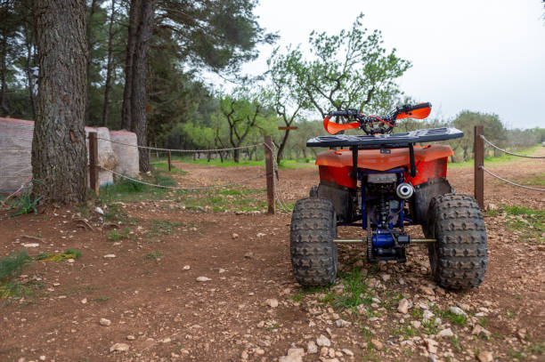 istock Red Quad Motorcycle in the Countryside 2187443132