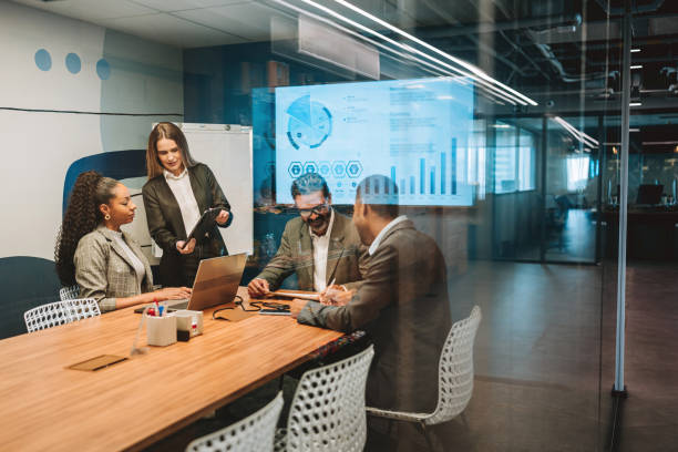 Business woman leading meeting stock photo