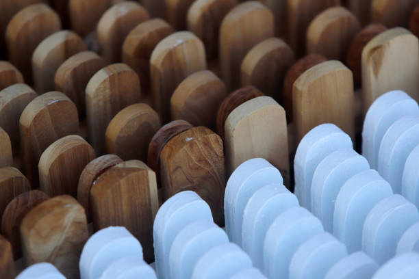 istock Close-Up of Wooden and White Elements Arranged in Rows 2187446711