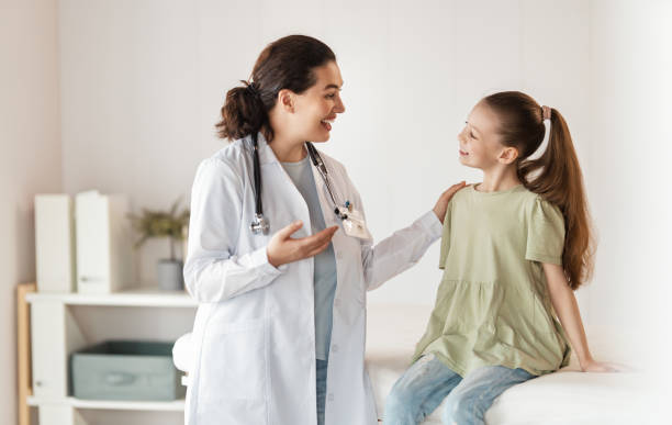 istock patient with a doctor in medical office 2187449286
