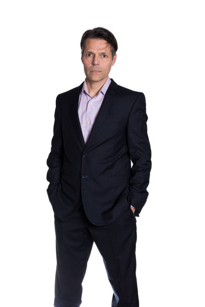 istock Middle-aged man standing looking at the camera, on white background, wearing formal clothes. 2187452295