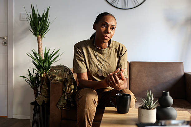 istock Female soldier at a talking therapy 2187457933