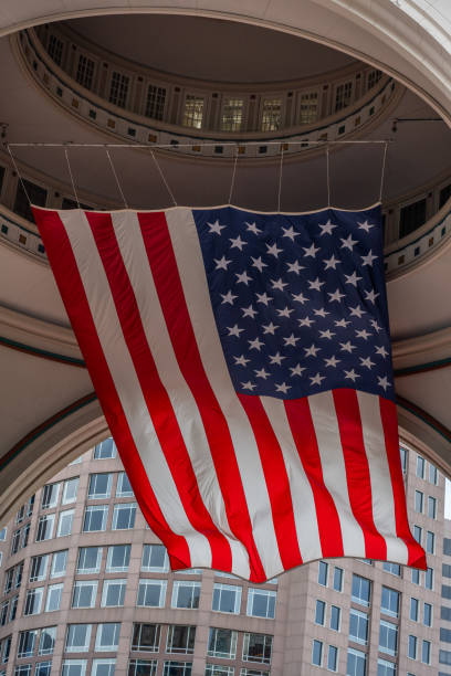 istock Large US Flag hanging from Cieling on Circular buidling 2187460363