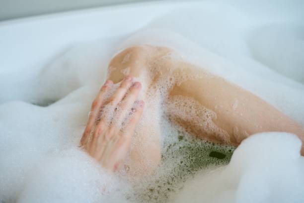 istock Female Body Covered with Foam 2187463014