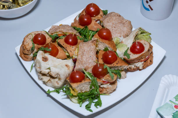 istock Small sandwiches with meat and vegetables 2187467738