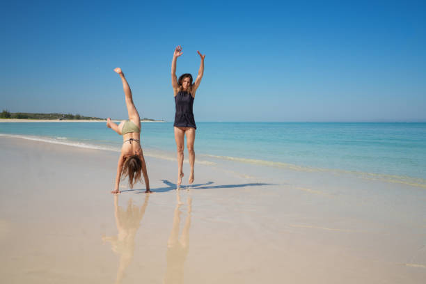 Adorable little girl at beach during summer vacation
