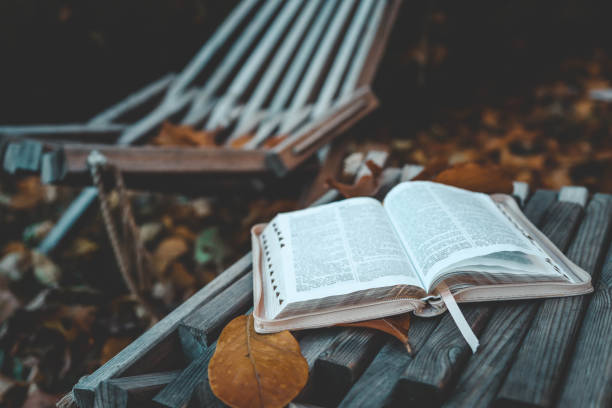 Open Bible in Autumn Garden, Morning Prayer.