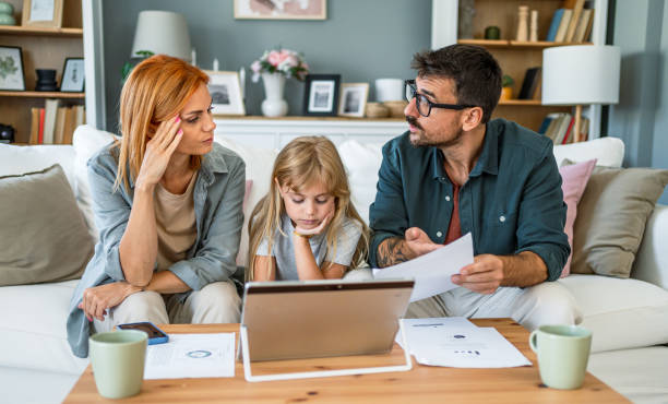 istock Young family feeling distressed managing finances 2187470621