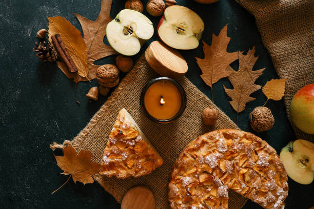 istock Candle and homemade apple pie, autumn mood 2187472123