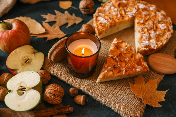 istock Candle and homemade apple pie, autumn mood 2187472130