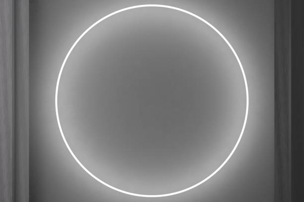 istock Abstract industrial-style concrete background with modern circular white neon light accent. Sleek and contemporary design perfect for minimalist and industrial themes. Copy space in the middle. 3D. 2187472654