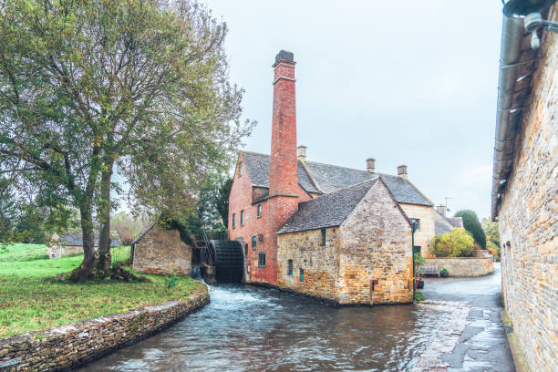 istock Picturesque Cotswolds, Lower Slaughter in fog 2187472927