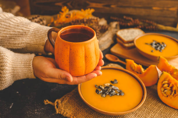 istock Cup of tea in hands, autumn mood 2187473094