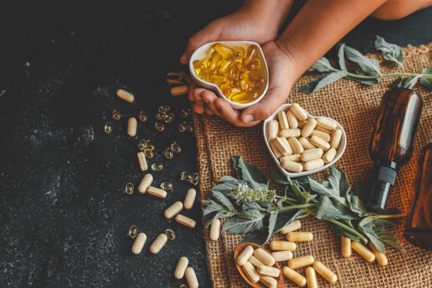 istock Natural organic vitamins in hands close-up 2187473435