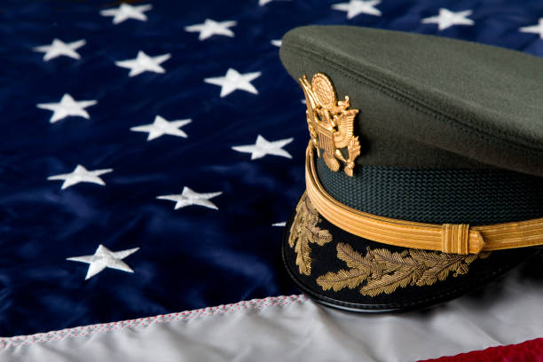 istock Army Service Dress Cap, on American Flag background 2187473530