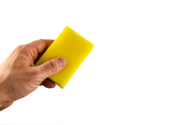 Washing dishes, colorful sponges for washing dishes on a white background