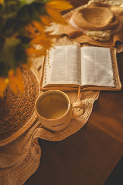 istock An open Bible in a cozy home atmosphere 2187473800