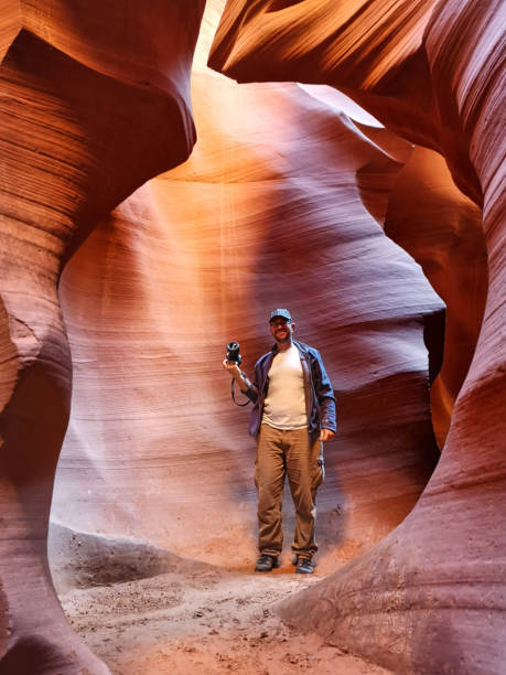 istock Photographer exploring antelope canyon, arizona 2187475522