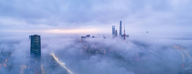 istock Panoramic Aerial View of Shanghai Skyline on Thick Cloud, China 2187478831